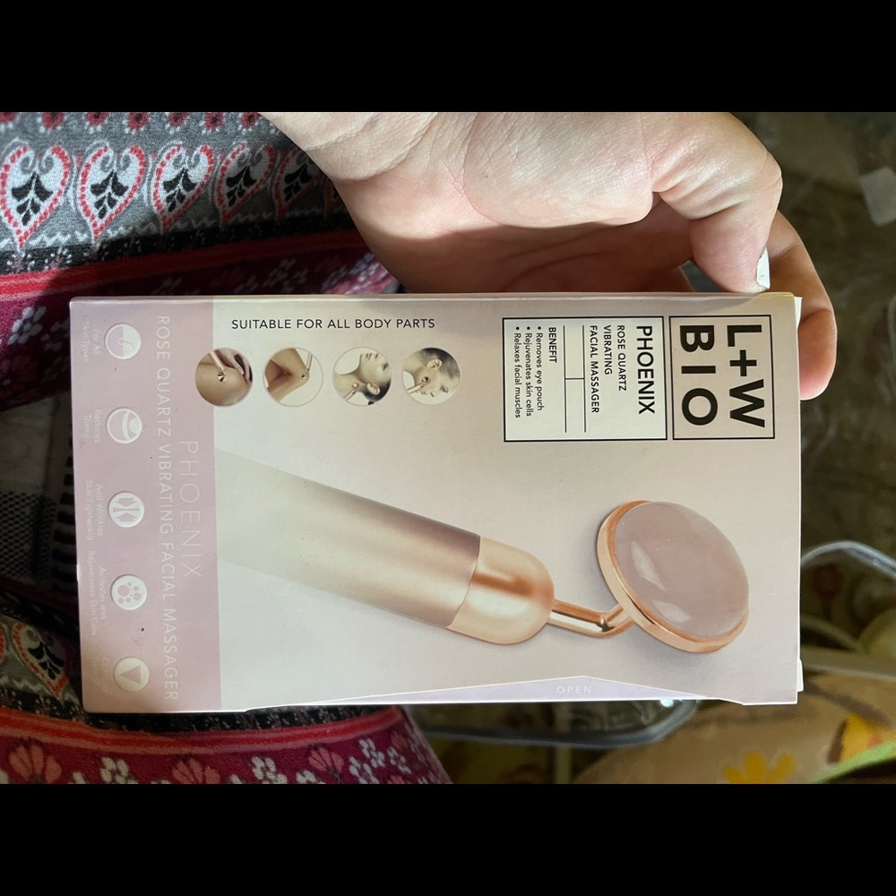 Rose quartz facial massage tool